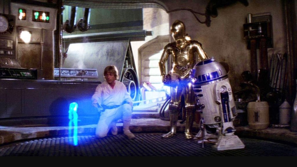 Star Wars IV: A New Hope, released in 1977, while hologram technology was already discovered, the movie redefined the purpose and usage of the technology. (Picture Courtesy: Lucas Films; A still from Star Wars IV)